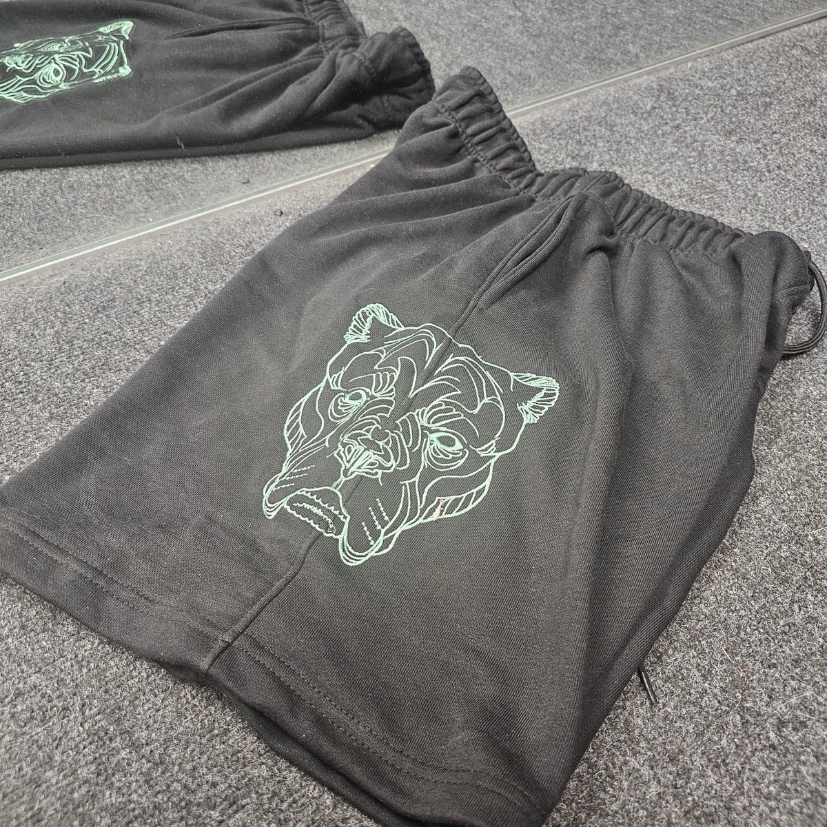 ALPHA NEON® BLACK SHORTS
