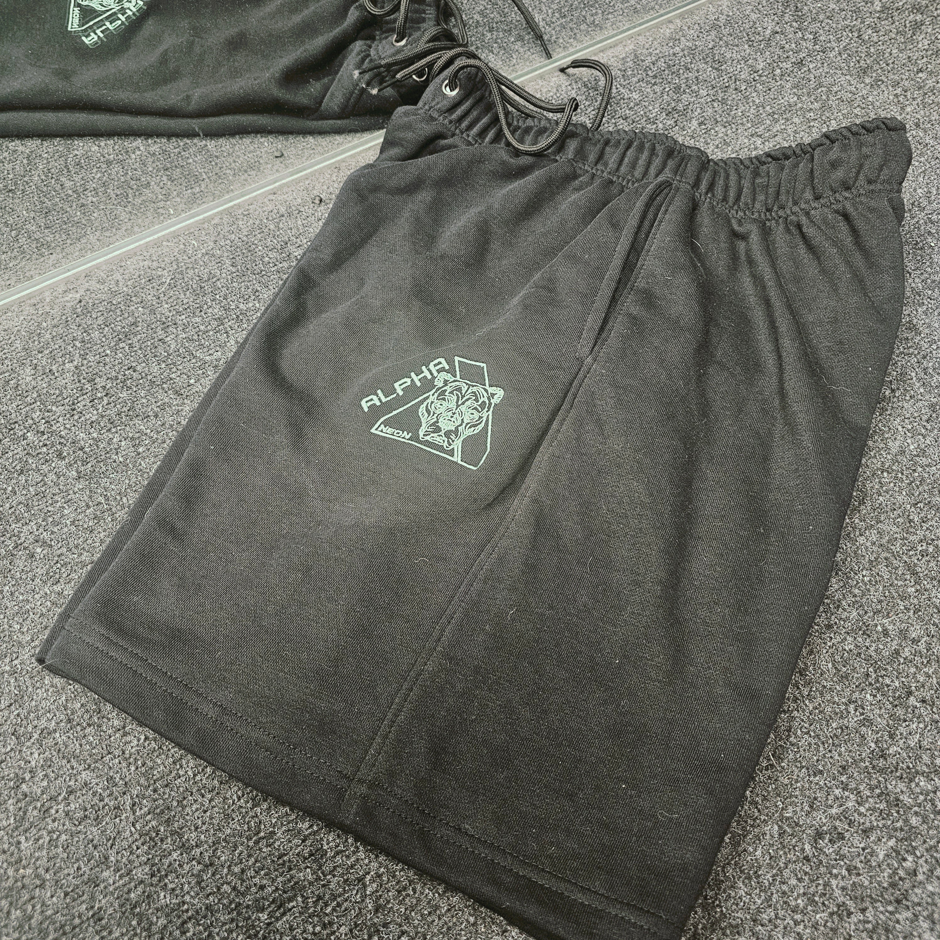 ALPHA NEON® BLACK SHORTS