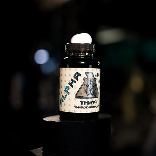 A bottle of Alpha Thry+ Thyroid supplement displayed on a black pedestal against a dark, blurred background.
